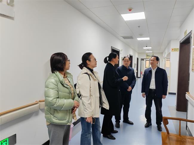 图为走访残疾人用人单位现场
